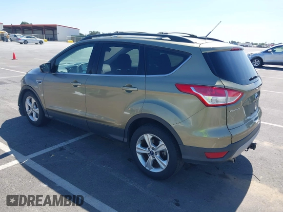 2013 Ford Escape SE with VIN 1FMCU0G99DUC05901, listed as a IAAI auction lot 42194672 with 121,435 mi miles and . Bid and sale history available at DreamBid. Image 3.