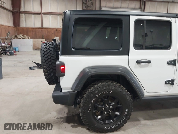 2023 Jeep Wrangler Sport S with VIN 1C4HJXDN2PW632584, listed as a IAAI auction lot 41965191 with 20,288 mi miles and . Bid and sale history available at DreamBid. Image 19.