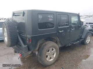 2010 Jeep Wrangler Unlimited Sport with VIN 1J4BA3H16AL163816, listed as a IAAI auction lot 41556866 with 160,224 mi miles. Bid and sale history available at carsss.com. Image 4.