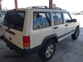 1997 Jeep Cherokee Sport with VIN 1J4FJ68S4VL584953, listed as a IAAI auction lot 42696694 with 135,545 mi miles and . Bid and sale history available at DreamBid. Image 4.