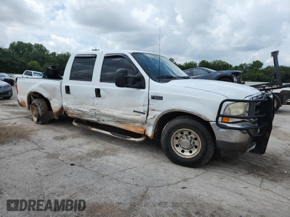 2002 Ford F-250 XL with VIN 1FTNW20F32EA27266, listed as a Copart auction lot 63110855 with 265,546 mi miles and Salvage title. Bid and sale history available at DreamBid. Image 4.