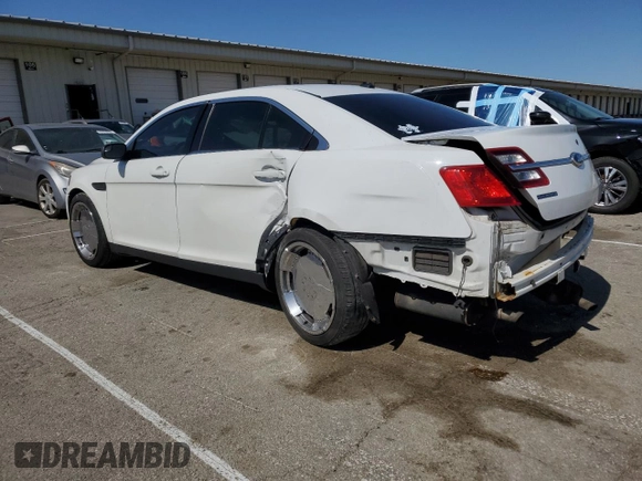 2015 Ford Police Interceptor with VIN 1FAHP2MK7FG124293, listed as a Copart auction lot 52503825 with 126,088 mi miles and Clean title. Bid and sale history available at DreamBid. Image 2.