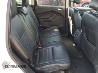 2014 Ford Escape Titanium z VIN 1FMCU0J9XEUD01904, wystawiony jako Copart lot #61819555 z przebiegiem 217 794 mil mil oraz Czysty tytuł • Clean title. Historia ofert i sprzedaży dostępna na DreamBid. Obrazek 10.