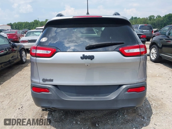 2016 Jeep Cherokee Altitude with VIN 1C4PJLAB7GW307900, listed as a IAAI auction lot 42611390 with 130,123 mi miles and . Bid and sale history available at DreamBid. Image 17.