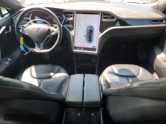 2014 Tesla Model S 60 z VIN 5YJSA1H11EFP64764, wystawiony jako Copart lot #64265815 z przebiegiem 126 191 mil mil oraz Szkoda całkowita • Salvage title. Historia ofert i sprzedaży dostępna na DreamBid. Obrazek 8.