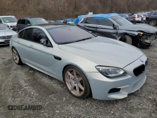 2014 BMW M6 z VIN WBS6C9C5XED467254, wystawiony jako Copart lot #50335275 z przebiegiem 67 534 mil mil oraz Szkoda całkowita • Salvage title. Historia ofert i sprzedaży dostępna na DreamBid. Obrazek 4.