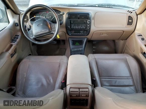 1999 Ford Explorer XLT z VIN 1FMZU32E0XZB31890, wystawiony jako Copart lot #84967184 z przebiegiem 220 424 mil mil oraz Szkoda całkowita • Salvage title. Historia ofert i sprzedaży dostępna na DreamBid. Obrazek 8.