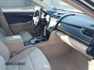 2014 Toyota Camry L with VIN 4T4BF1FK6ER393445, listed as a IAAI auction lot 42044946 with 130,169 mi miles. Bid and sale history available at carsss.com. Image 5.