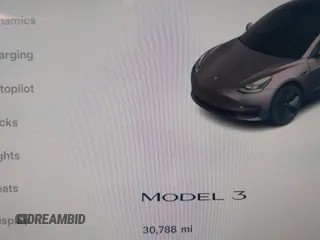 2023 Tesla Model 3 with VIN 5YJ3E1EAXPF405588, listed as a IAAI auction lot 42348952 with 30,788 mi miles and . Bid and sale history available at DreamBid. Image 16.