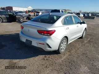 2023 Kia Rio LX with VIN 3KPA24AD9PE618894, listed as a IAAI auction lot 41771921 with 37,209 mi miles. Bid and sale history available at carsss.com. Image 4.