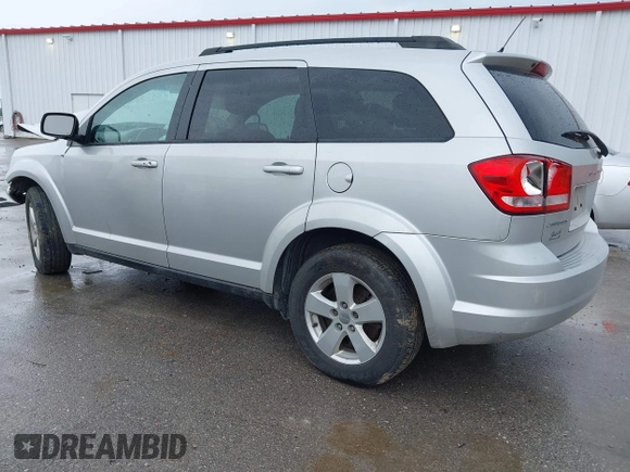 2013 Dodge Journey Canada Value z VIN 3C4PDCABXDT563439, wystawiony jako IAAI lot #42227899 z przebiegiem 213 199 mil mil oraz . Historia ofert i sprzedaży dostępna na DreamBid. Obrazek 3.