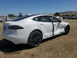2017 Tesla Model S 100D с VIN 5YJSA1E27HF199003, выставлен на аукционе Copart как лот 59214775 с пробегом 99 673 миль миль и Списание • Salvage title. История ставок и продаж доступна на DreamBid. Изображение 3.