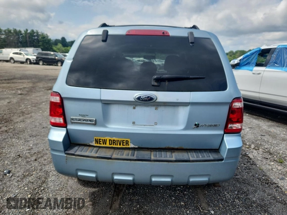 2009 Ford Escape Hybrid with VIN 1FMCU59309KB77043, listed as a Copart auction lot 63925395 with 201,171 mi miles and Clean title. Bid and sale history available at DreamBid. Image 6.