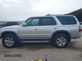 1999 Toyota 4Runner SR5 z VIN JT3GN86R1X0123115, wystawiony jako IAAI lot #41505478 z przebiegiem 173 141 mil mil oraz . Historia ofert i sprzedaży dostępna na DreamBid. Obrazek 15.