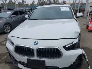 2022 BMW X2 sDrive28i z VIN WBXYH9C06N5U37719, wystawiony jako IAAI lot #42355050 z przebiegiem 33 127 mil mil oraz . Historia ofert i sprzedaży dostępna na DreamBid. Obrazek 11.