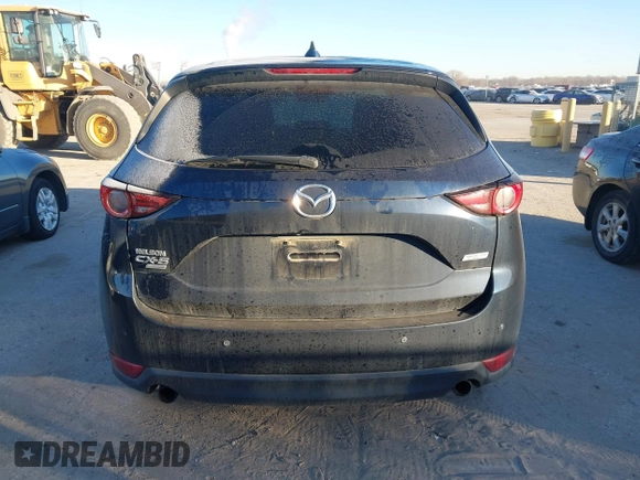 2019 Mazda CX-5 Signature with VIN JM3KFBEY5K0656965, listed as a IAAI auction lot 41421453 with 99,073 mi miles. Bid and sale history available at carsss.com. Image 16.