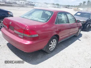 2002 Honda Accord SE z VIN 1HGCG56712A020105, wystawiony jako IAAI lot #42504254 z przebiegiem 317 533 mil mil oraz . Historia ofert i sprzedaży dostępna na DreamBid. Obrazek 4.