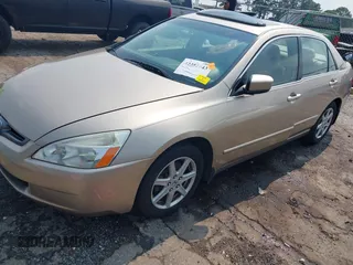 2004 Honda Accord EX with VIN 1HGCM66504A090503, listed as a IAAI auction lot 42351643 with 143,827 mi miles and . Bid and sale history available at DreamBid. Image 17.