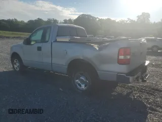2005 Ford F-150 XL with VIN 1FTRF12W45NB13974, listed as a Copart auction lot 55701635 with 385,185 mi miles and Salvage title. Bid and sale history available at DreamBid. Image 2.