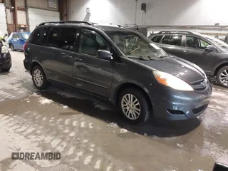 2009 Toyota Sienna XLE with VIN 5TDBK22C29S028110, listed as a IAAI auction lot 41496169 with 253,057 mi miles. Bid and sale history available at carsss.com. Image 1.
