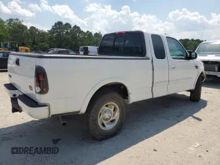 2000 Ford F-150 XL z VIN 1FTRX18L0YNA65615, wystawiony jako Copart lot #58508375 z przebiegiem Nie podano mil oraz Szkoda całkowita • Salvage title. Historia ofert i sprzedaży dostępna na DreamBid. Obrazek 3.