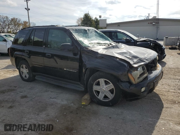 2003 Chevrolet TrailBlazer LTZ with VIN 1GNDT13S332196883, listed as a Copart auction lot 77031124 with 167,328 mi miles and Salvage Title. Bid and sale history available at DreamBid. Image 4.