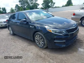 2018 Kia Optima LX z VIN 5XXGT4L36JG257392, wystawiony jako IAAI lot #42552144 z przebiegiem 79 795 mil mil oraz . Historia ofert i sprzedaży dostępna na DreamBid. Obrazek 1.