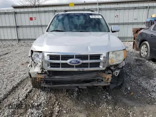 2011 Ford Escape Limited z VIN 1FMCU0E77BKA37976, wystawiony jako Copart lot #50186145 z przebiegiem Nie podano mil oraz Szkoda całkowita • Salvage title. Historia ofert i sprzedaży dostępna na DreamBid. Obrazek 5.