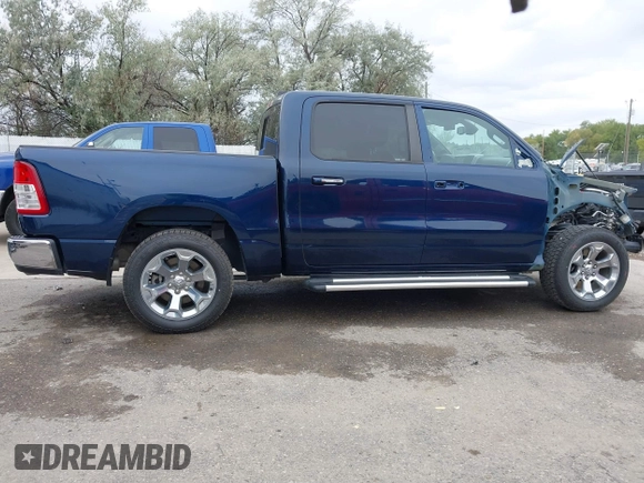 2019 Ram 1500 Big Horn/Lone Star with VIN 1C6SRFFT7KN663677, listed as a IAAI auction lot 40325088 with 77,035 mi miles. Bid and sale history available at carsss.com. Image 14.