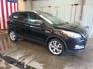 2013 Ford Escape Titanium z VIN 1FMCU9J90DUA98718, wystawiony jako Copart lot #63683005 z przebiegiem 101 036 mil mil oraz Czysty tytuł • Clean title. Historia ofert i sprzedaży dostępna na DreamBid. Obrazek 4.