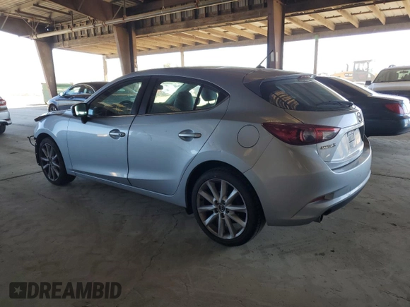 2017 Mazda 3 Touring with VIN 3MZBN1L79HM113024, listed as a Copart auction lot 55831015 with 102,267 mi miles and Salvage title. Bid and sale history available at DreamBid. Image 2.