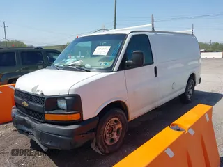 2012 Chevrolet Express Cargo Van with VIN 1GCWGFCA6C1147841, listed as a IAAI auction lot 42042056 with 248,374 mi miles. Bid and sale history available at carsss.com. Image 2.
