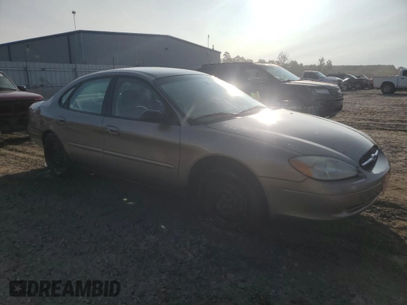 2003 Ford Taurus z VIN 1FAFP52253A170456, wystawiony jako Copart lot #70009824 z przebiegiem 216 567 mil mil oraz Szkoda całkowita • Salvage title. Historia ofert i sprzedaży dostępna na DreamBid. Obrazek 4.