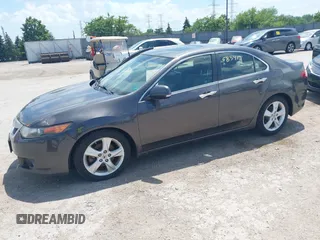 2010 Acura TSX with VIN JH4CU2F67AC015456, listed as a IAAI auction lot 42583419 with 220,012 mi miles and . Bid and sale history available at DreamBid. Image 2.