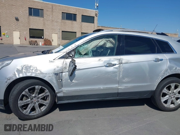 2011 Cadillac SRX Premium Collection with VIN 3GYFNFEYXBS599279, listed as a IAAI auction lot 42372367 with 97,888 mi miles and . Bid and sale history available at DreamBid. Image 6.