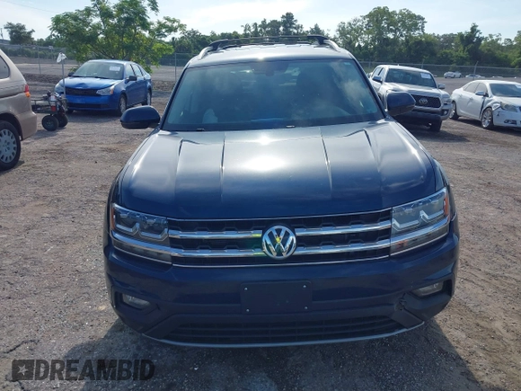2018 Volkswagen Atlas SE with VIN 1V2CR2CA1JC561003, listed as a IAAI auction lot 42556798 with 124,147 mi miles and . Bid and sale history available at DreamBid. Image 12.