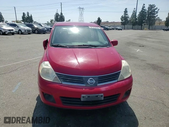 2007 Nissan Versa SL z VIN 3N1BC13E17L423098, wystawiony jako Copart lot #54123235 z przebiegiem 101 217 mil mil oraz Szkoda całkowita • Salvage title. Historia ofert i sprzedaży dostępna na DreamBid. Obrazek 13.