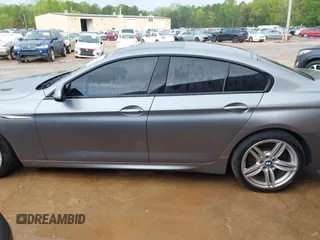 2016 BMW 6 Series 640i xDrive with VIN WBA6D2C58GGT66160, listed as a IAAI auction lot 41130666 with 102,064 mi miles and . Bid and sale history available at carsss.com. Image 15.
