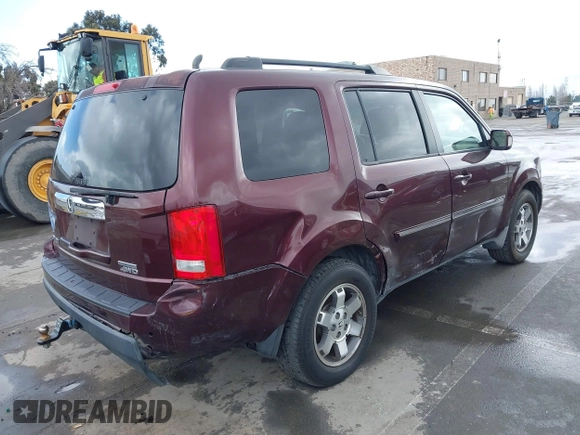 2009 Honda Pilot Touring with VIN 5FNYF48959B007813, listed as a IAAI auction lot 41823645 with 200,571 mi miles and . Bid and sale history available at carsss.com. Image 4.
