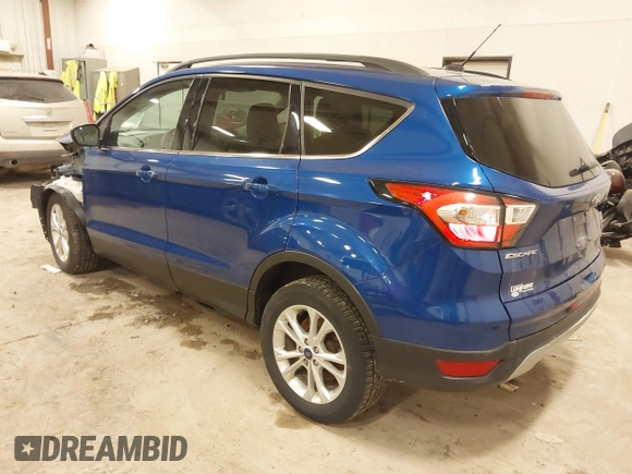 2018 Ford Escape SE with VIN 1FMCU9GD4JUA83470, listed as a IAAI auction lot 41272882 with 105,661 mi miles. Bid and sale history available at carsss.com. Image 3.