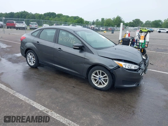2017 Ford Focus SE with VIN 1FADP3F28HL235303, listed as a IAAI auction lot 42487766 with 92,187 mi miles and . Bid and sale history available at DreamBid. Image 1.