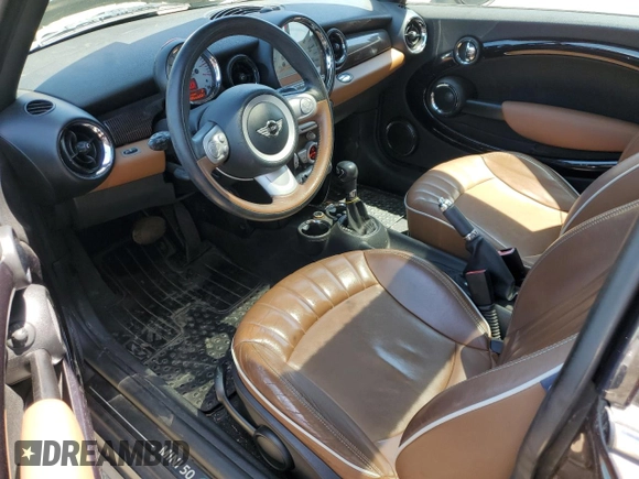 2010 MINI Hardtop with VIN WMWMF3C52ATZ62824, listed as a Copart auction lot 55175395 with 110,585 mi miles and Salvage Title. Bid and sale history available at DreamBid. Image 8.