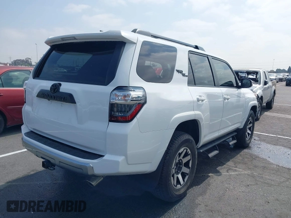 2021 Toyota 4Runner TRD Off Road Premium with VIN JTERU5JR7M5940287, listed as a IAAI auction lot 42592875 with 21,771 mi miles and . Bid and sale history available at DreamBid. Image 4.