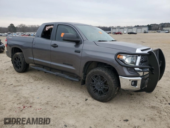 2021 Toyota Tundra SR with VIN 5TFUY5F18MX012725, listed as a Copart auction lot 52550205 with 54,727 mi miles and Salvage title. Bid and sale history available at DreamBid. Image 4.
