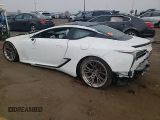2018 Lexus LC 500h z VIN JTHHP5AY9JA000511, wystawiony jako Copart lot #72041014 z przebiegiem Nie podano mil oraz Szkoda całkowita • Salvage title. Historia ofert i sprzedaży dostępna na DreamBid. Obrazek 2.