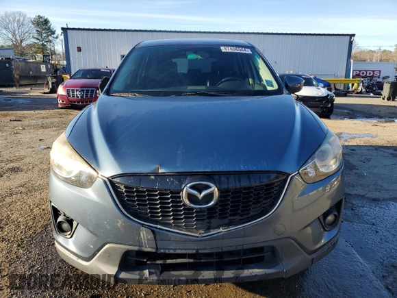 2015 Mazda CX-5 Grand Touring with VIN JM3KE2DY9F0483509, listed as a Copart auction lot 87406944 with 176,213 mi miles and Salvage Title. Bid and sale history available at carsss.com. Image 5.