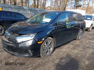 2024 Honda Odyssey Touring z VIN 5FNRL6H89RB042354, wystawiony jako IAAI lot #41469495 z przebiegiem 8 477 mil mil oraz . Historia ofert i sprzedaży dostępna na DreamBid. Obrazek 2.