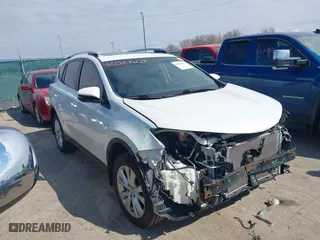 2013 Toyota RAV4 Limited with VIN 2T3DFREV6DW004791, listed as a IAAI auction lot 42021607 with 214,689 mi miles. Bid and sale history available at carsss.com. Image 1.