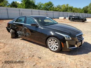 2016 Cadillac CTS RWD with VIN 1G6AP5SX3G0157316, listed as a Copart auction lot 69514114 with 77,934 mi miles and Salvage title. Bid and sale history available at DreamBid. Image 4.