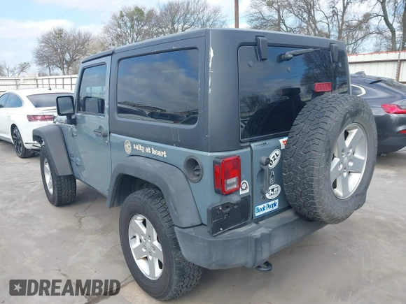 2014 Jeep Wrangler Sport with VIN 1C4AJWAGXEL177449, listed as a IAAI auction lot 41741519 with 117,056 mi miles and . Bid and sale history available at carsss.com. Image 3.